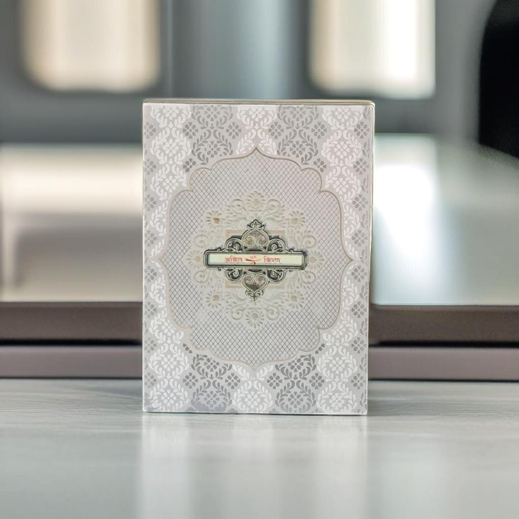 A White And Silver Ornate Wedding Invitation