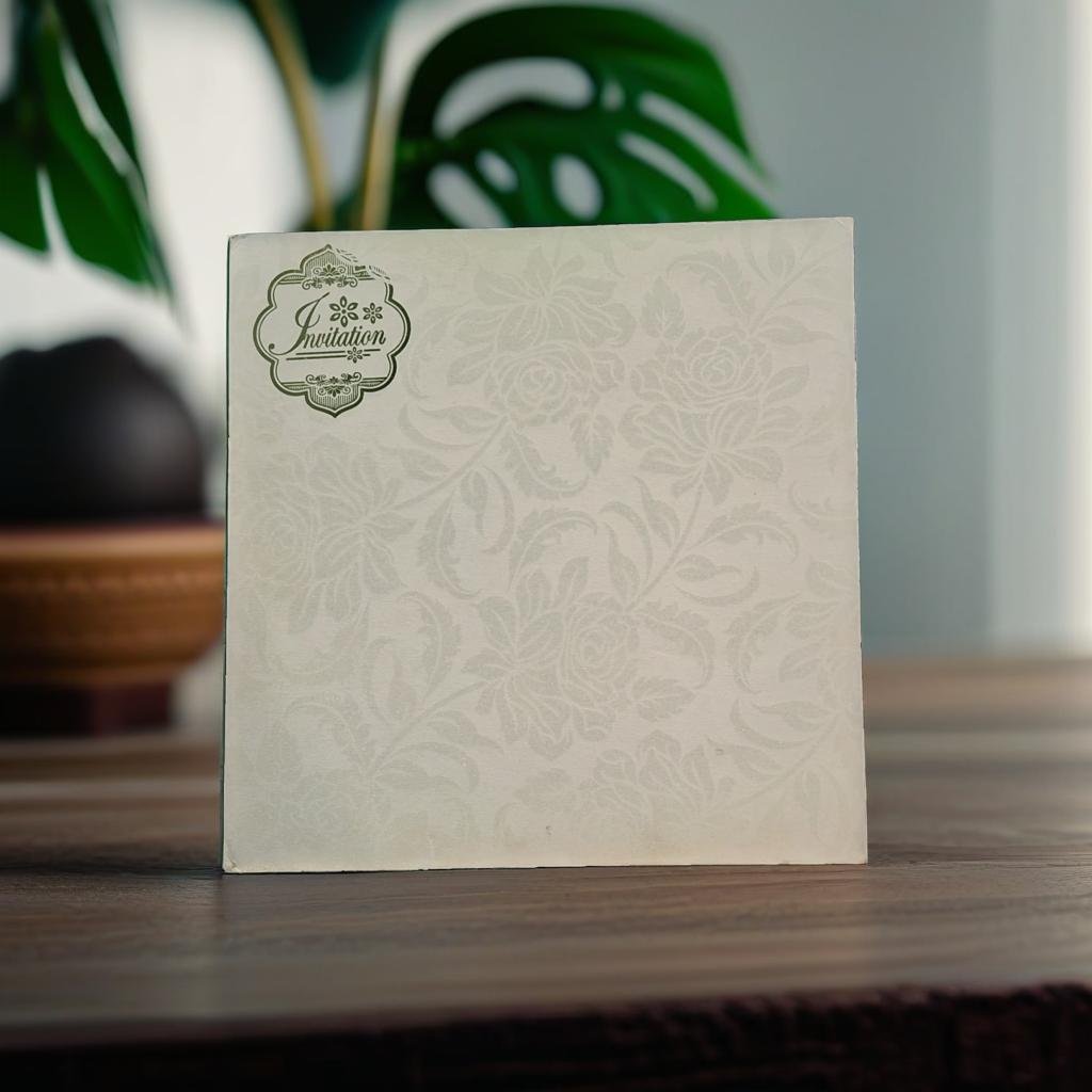 A White Floral Embossed Wedding Card