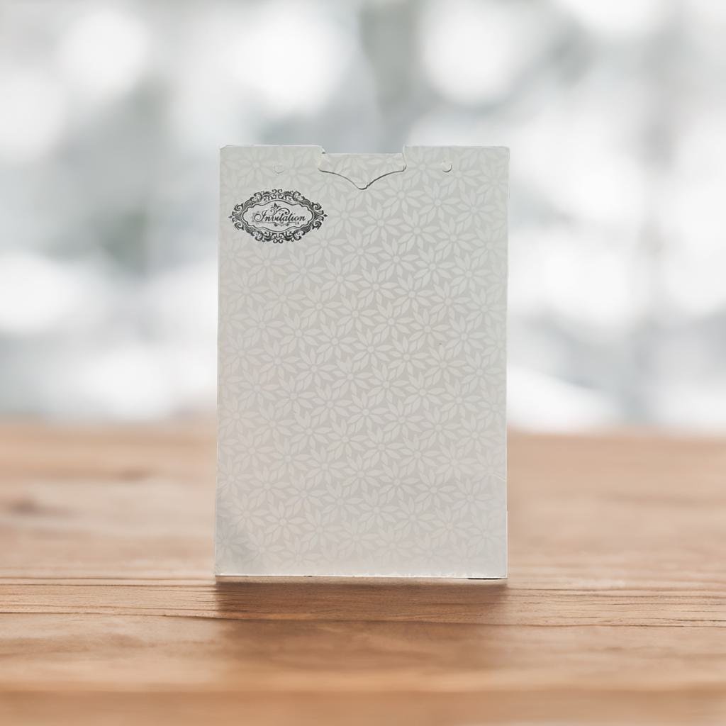 A White Laser Cut Card With A Intricate Design On It