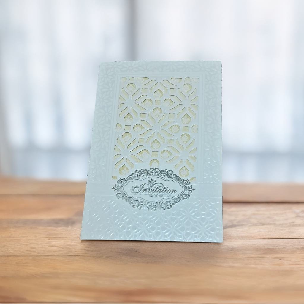 A White Laser Cut Card With A Intricate Design On It