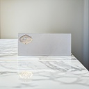 A Gold And White Invitation Card With A Gold Border.