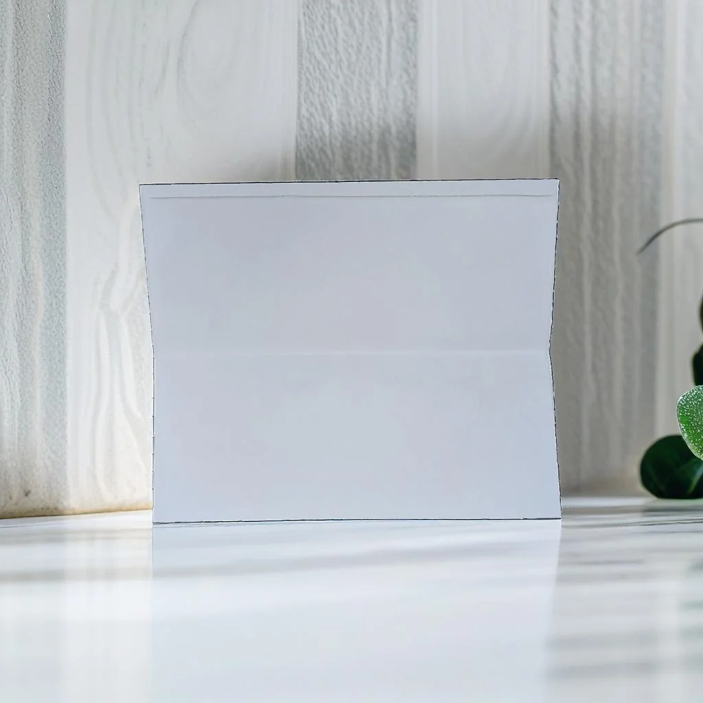 A Gold And White Invitation Card With A Gold Border.