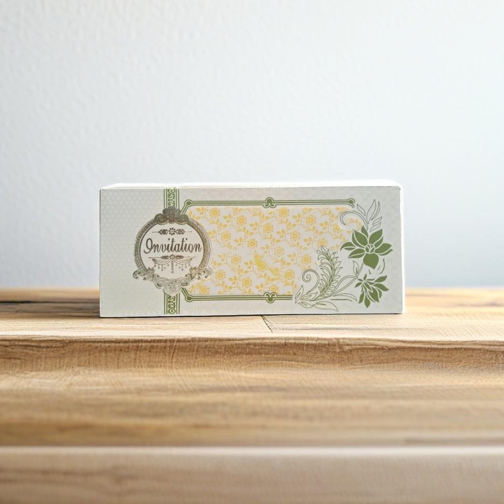 A Card With Green Intricate Floral Designs