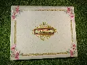 A Beautiful Wedding Card with name plate and strips