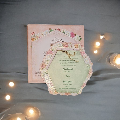 A beautiful pink wedding card with a pink floral design curton card like MDF cards.  