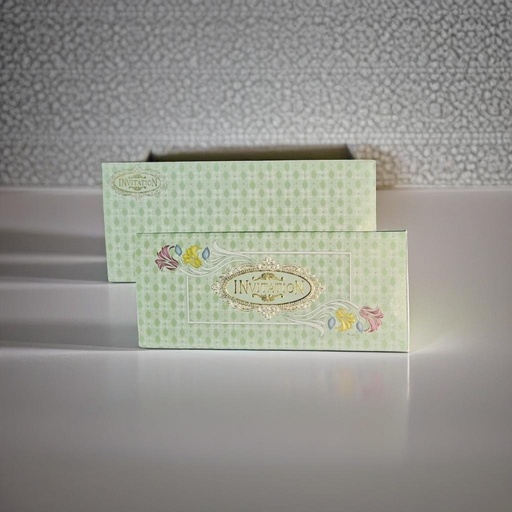 A Green Wedding Card With A Gold Foiled Design.