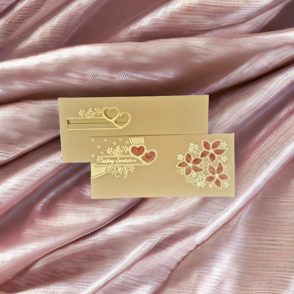 A Cream Wedding Card With Red And Golden Design On It